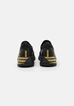 EA7 Emporio Armani Crusher Distance Unisex - Trainers - Triple Black/Gold -Famous Lady Shoe Store 06b053c3c76946a28f2e77f6324f99ee