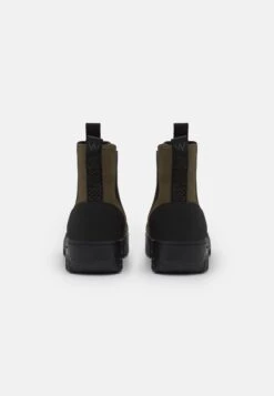 Woden Magda Track Warm - Winter Boots - Dark Olive -Famous Lady Shoe Store 1c1c07afd73a49bd9b5787027caa9e93