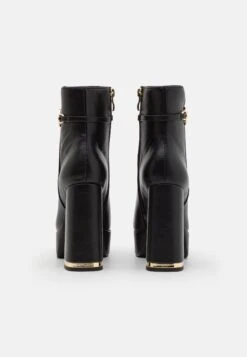 TWINSET Tronchetto Con Plateau E Catena Oval - Platform Ankle Boots - Nero -Famous Lady Shoe Store 335e614110ea4980a4b704e43bf637e2