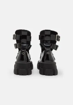 Steve Madden Tied Up - Platform Ankle Boots - Black -Famous Lady Shoe Store 63ffc2db936e4c3a9718c9a18d3da11b